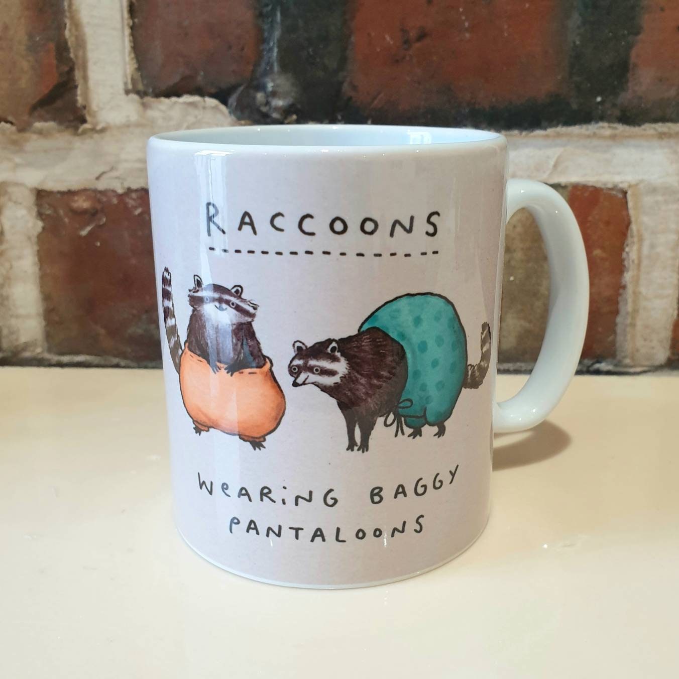 Raccoons Wearing Baggy Pantaloons 11oz Mug